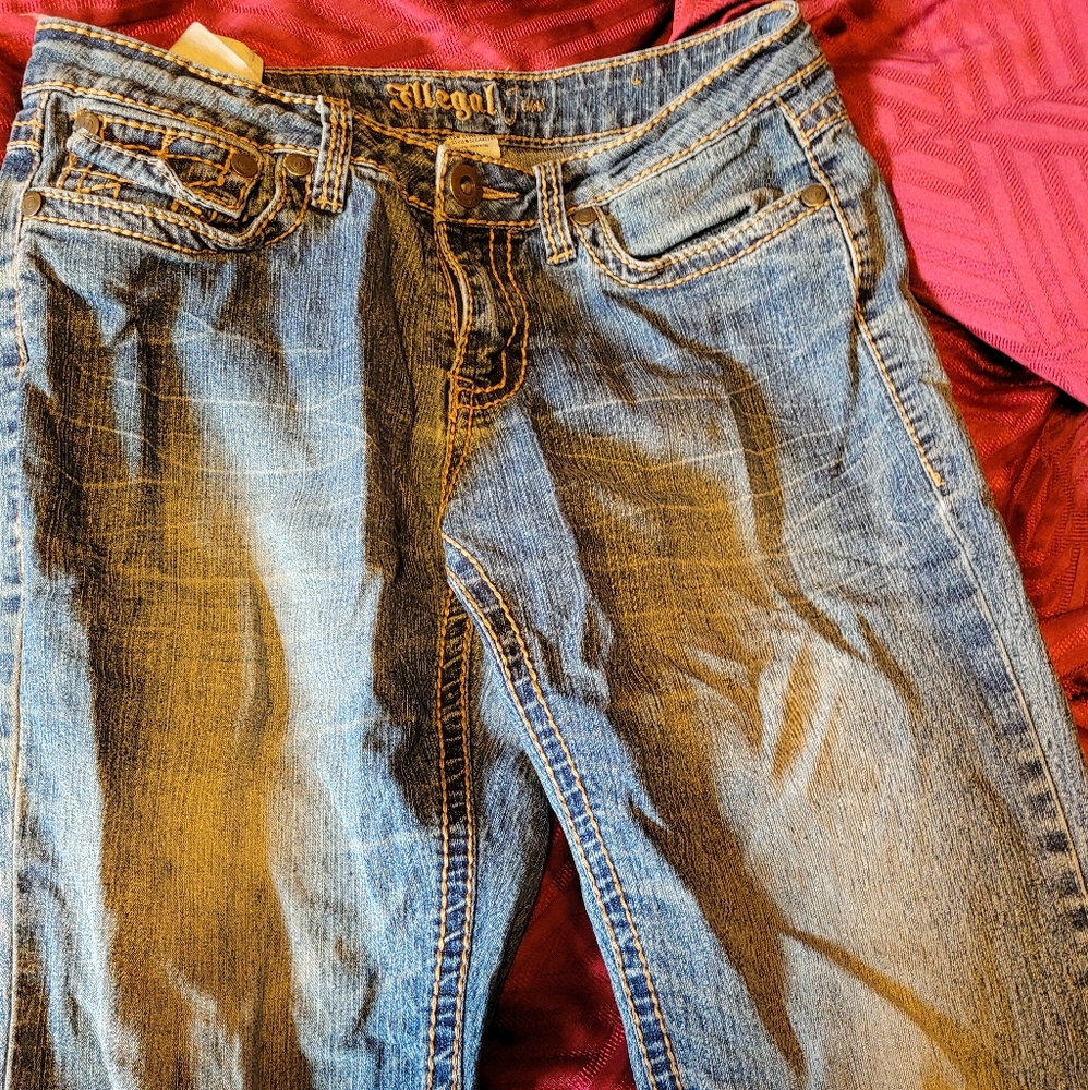 Illegal brand ladies blue jeans, size 7